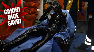 Kediyi kurtarmak için fuel-oil kuyusuna atladı!