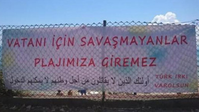 'Vatanı için savaşmayanlar plajımıza giremez' pankartı kaldırıldı