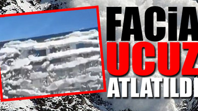 Kars'ta çatıda biriken kar çığ gibi düştü