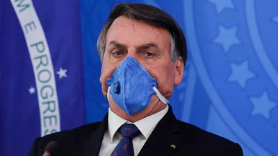 Bolsonaro 'koronavirüs'e inanmamaya devam ediyor: Valinin plaj yasağı diktatörce