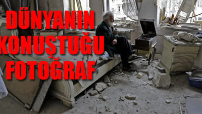 Enkazın ortasında müzik dinleyip, pipo içen adamın hikayesi...