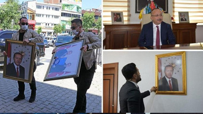 Kayyum olarak atanan Vali ilk iş odasına Erdoğan portresi astırdı