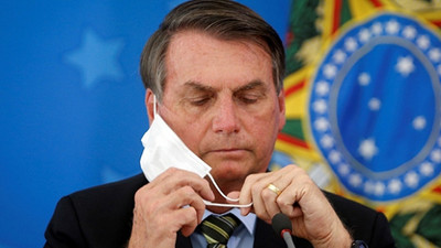Gazeteciler basın toplantısında maskesini indiren Bolsonaro'ya dava açacak