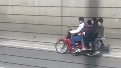 Bursa'da motosiklet üzerinde tehlikeli yolculuk