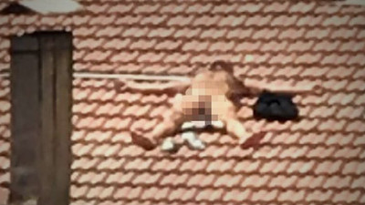 Çatıdaki çıplak gözaltına alındı