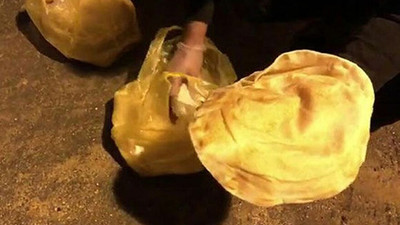 Koronavirüs hastası lavaş dağıtırken yakalandı