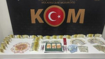 Eski paralardan sahte para yapan iki kişi yakalandı