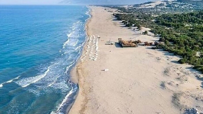 Patara'dan çalınan kumlar için tutanak tutan memur görevine iade edildi