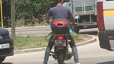 Pet şişeyle benzin alan genç polisi alarma geçirdi