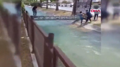 Mahsur kalan köpeği kurtarmak isterken su kanalına düştü