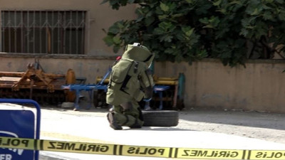 Evinin bahçesinde bulduğu el bombasını kaldırıma bıraktı