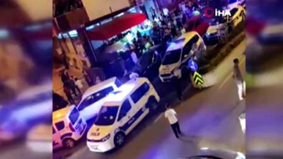 İşlem yapmak isteyen polise soda şişesi fırlatıp saldırdılar