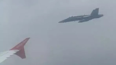 Yolcu uçağında korkutan anlar: Bir anda savaş jetleri belirdi