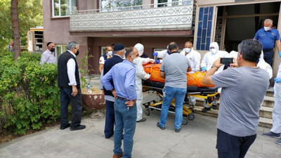 Çürümeye başlayan cesedi 6 saatlik müdahale ile binadan indirildi