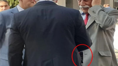 MHP'li başkan 30 Ağustos tören alanına silahla geldi