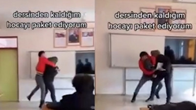 Dersinden kaldığı öğretmeninin kafasına poşet geçirdi