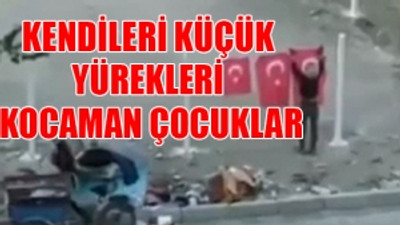 Hurda toplayan çocuklar; çöpte buldukları Türk Bayraklarını temizleyip astılar