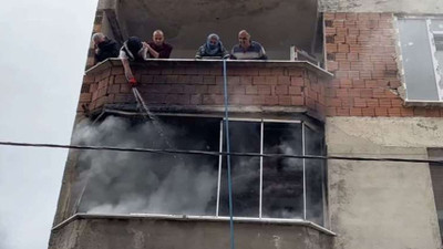 Arnavutköy'de yangın: Hortum ve kovalarla su taşıyarak söndürmeye çalıştılar