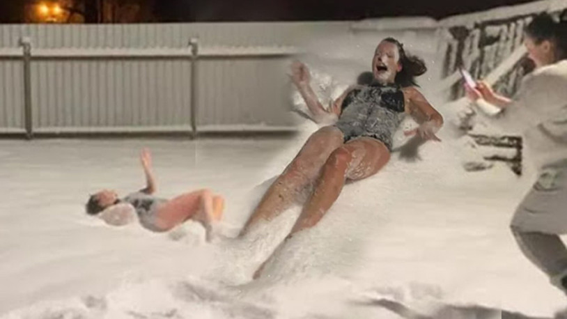 Ünlü sunucu Akyer mayoyla karlarda yuvarlandı