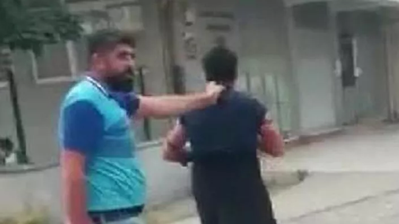 Eşini taciz ettiğini iddia ettiği adamı kadın kıyafeti giydirerek karakola götürdü