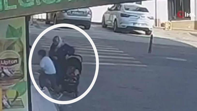 Yokuş aşağı kayan bebek arabası apartman bahçesine düştü